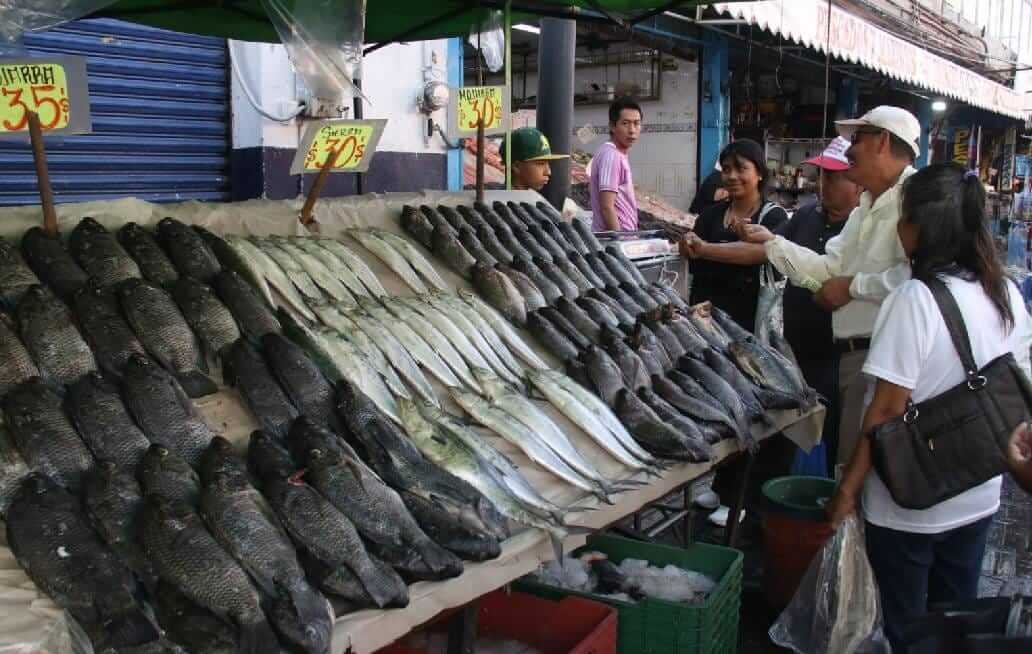Suben ventas de pescados y mariscos para la cena de Navidad: comerciantes